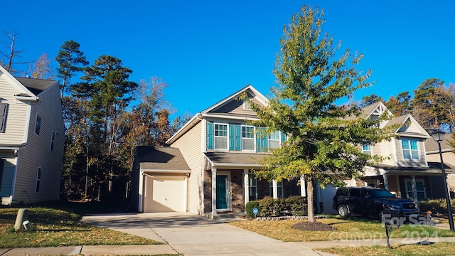 view of front of home with a garage