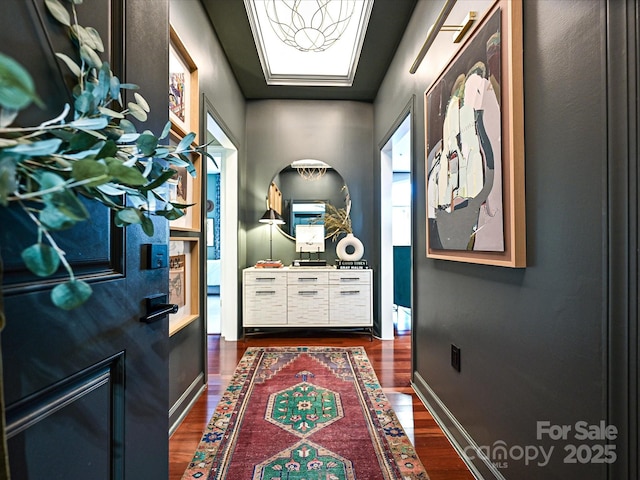 doorway to outside with dark hardwood / wood-style flooring