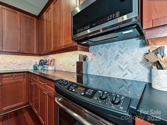 kitchen featuring backsplash and appliances with stainless steel finishes