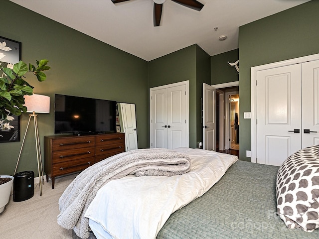 bedroom featuring ceiling fan and light colored carpet