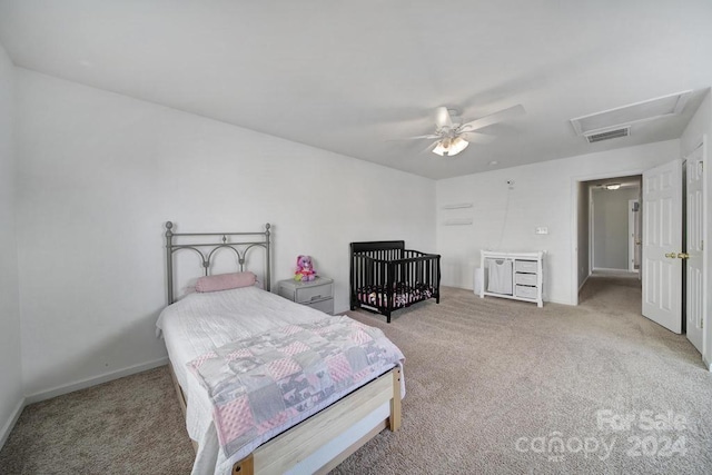 bedroom with light carpet and ceiling fan