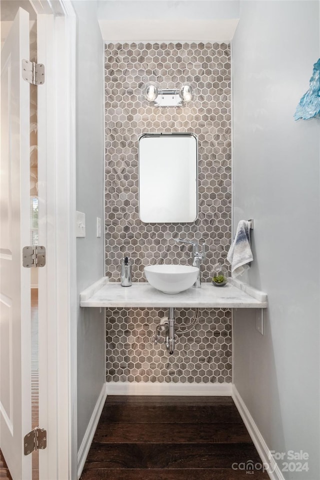 bathroom featuring vanity and hardwood / wood-style flooring