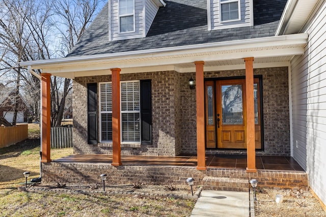 entrance to property featuring covered porch