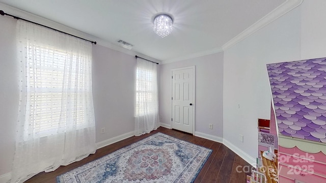 unfurnished room featuring dark hardwood / wood-style flooring and crown molding