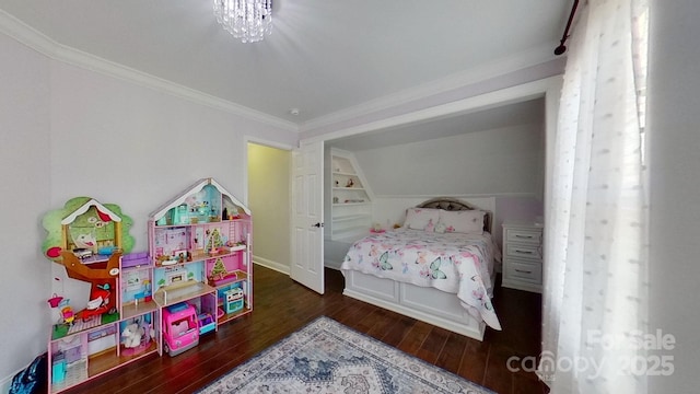 bedroom featuring ornamental molding and dark hardwood / wood-style floors