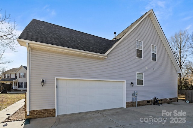 view of property exterior featuring a garage