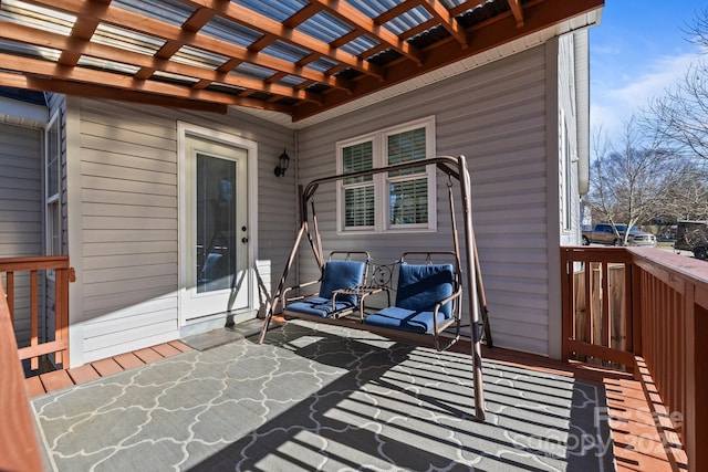 wooden terrace featuring a pergola