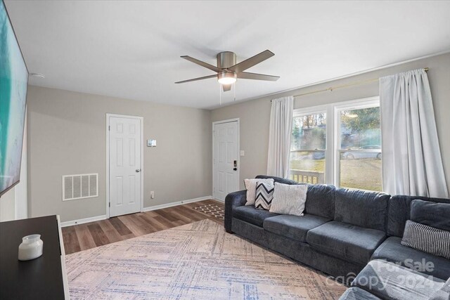 624 Dundeen Dr, Gastonia, NC 28052 - living area with wood finished floors, ceiling fan, and baseboards