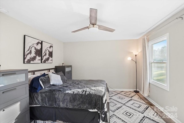 624 Dundeen Dr, Gastonia, NC 28052 - bedroom featuring baseboards, ceiling fan, and light wood-style flooring