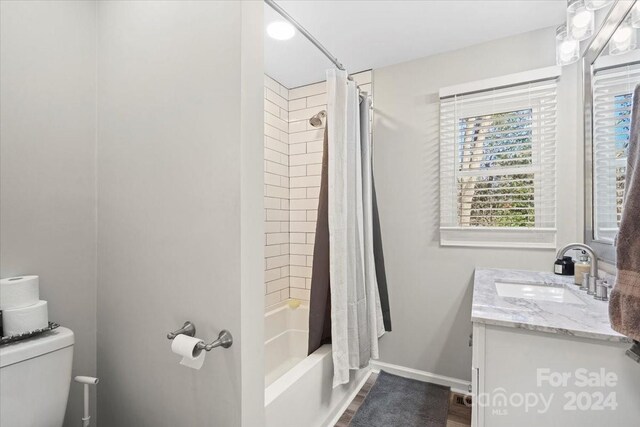 624 Dundeen Dr, Gastonia, NC 28052 - bathroom featuring toilet, vanity, and shower / bath combination with curtain