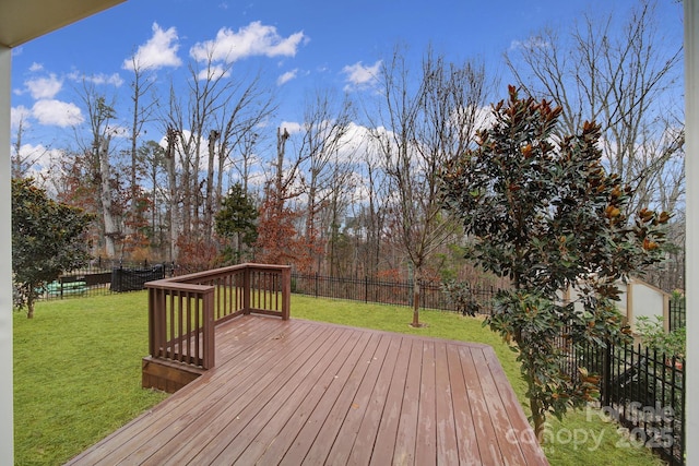 deck featuring a lawn