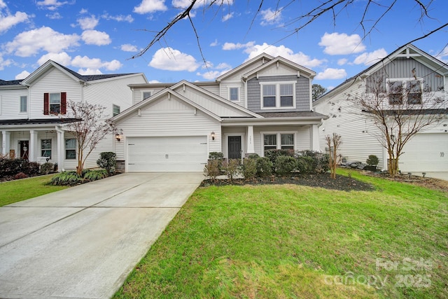 view of front of home with a garage and a front yard