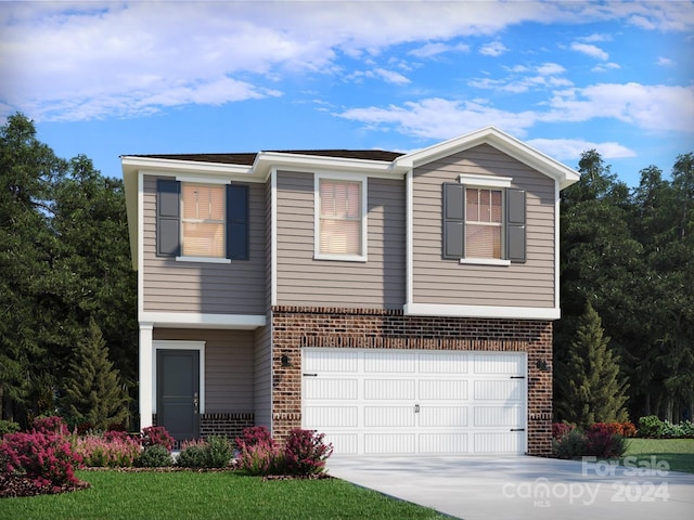 view of front facade with a front yard and a garage