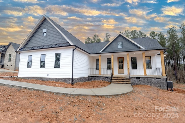 view of front of house with covered porch