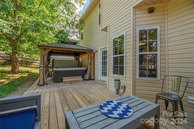 wooden deck featuring a gazebo