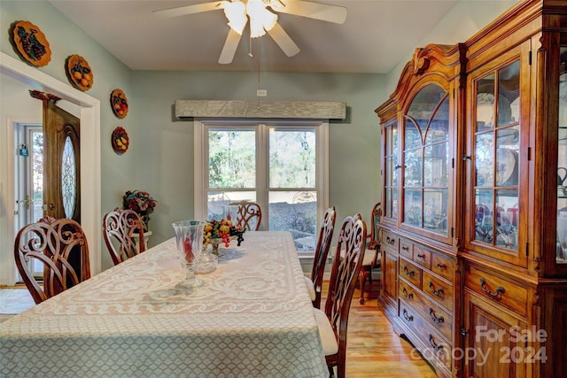 dining space featuring light hardwood / wood-style flooring and ceiling fan