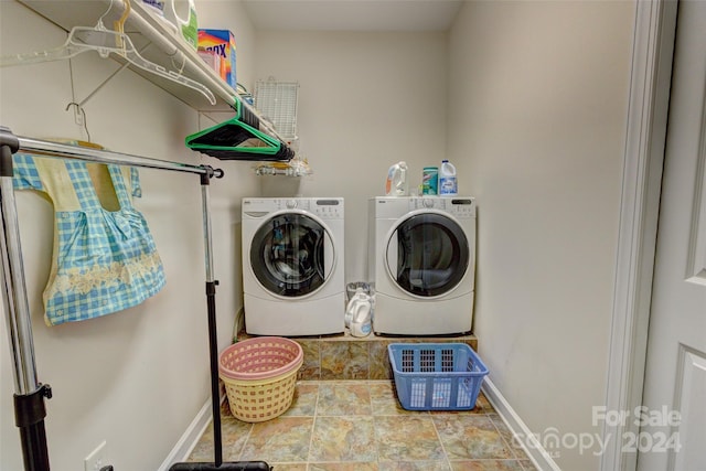 laundry room with independent washer and dryer