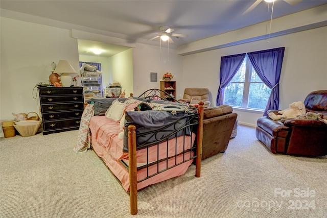 carpeted bedroom featuring ceiling fan