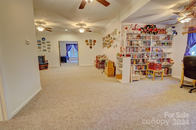 playroom with carpet flooring and ceiling fan