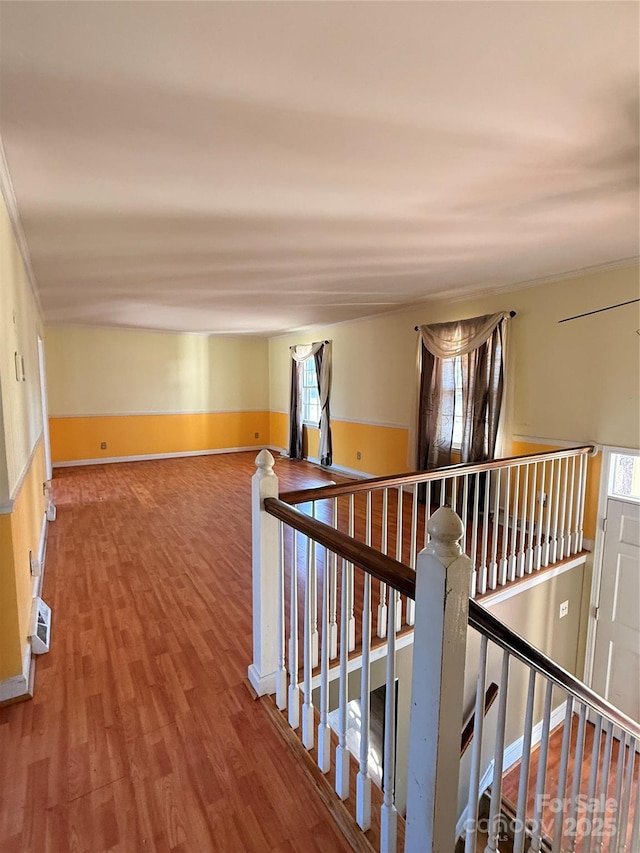 corridor featuring hardwood / wood-style flooring