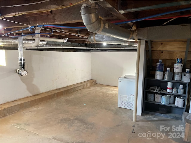 basement with fridge