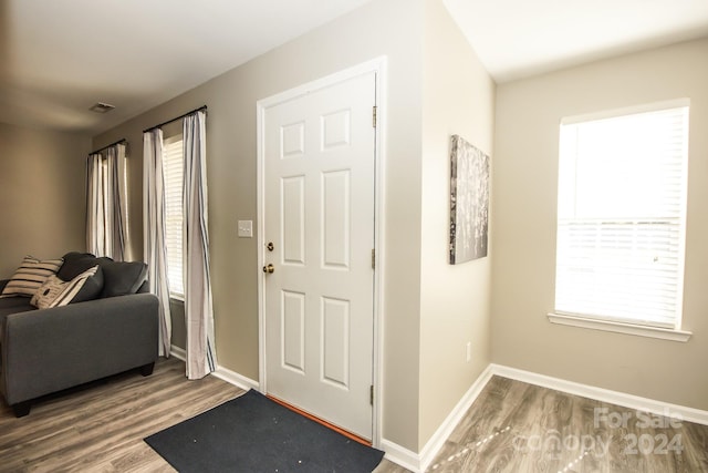 entrance foyer with hardwood / wood-style floors