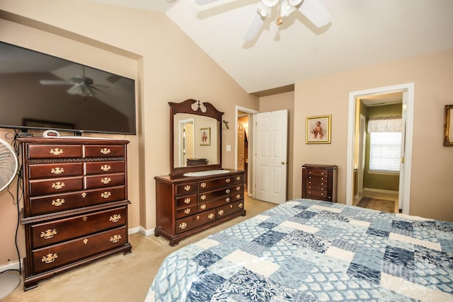 carpeted bedroom featuring vaulted ceiling and ceiling fan