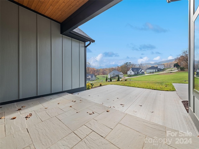 view of patio / terrace with a mountain view