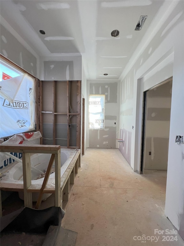 hallway featuring a wealth of natural light