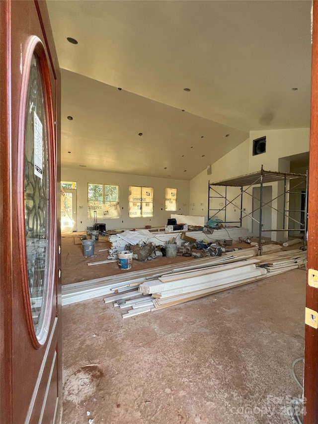 interior space featuring vaulted ceiling