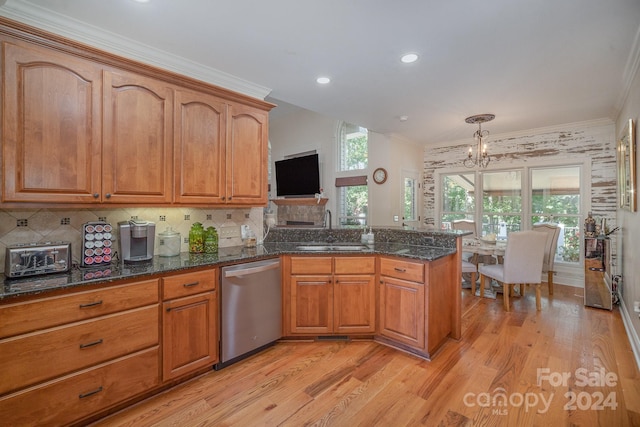 kitchen with dishwasher, sink, pendant lighting, light wood-type flooring, and ornamental molding