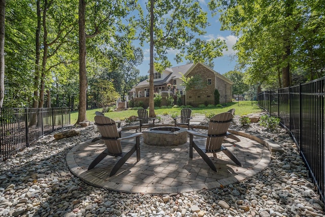 view of patio featuring an outdoor fire pit