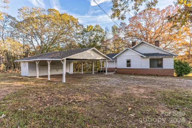 view of front of house featuring a carport