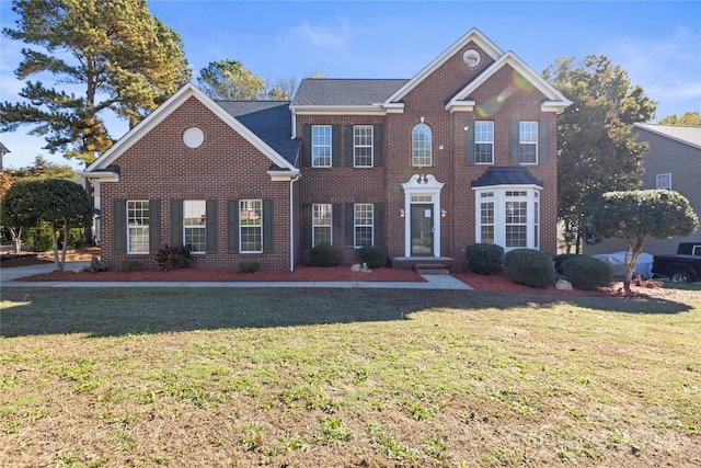 view of front facade featuring a front yard