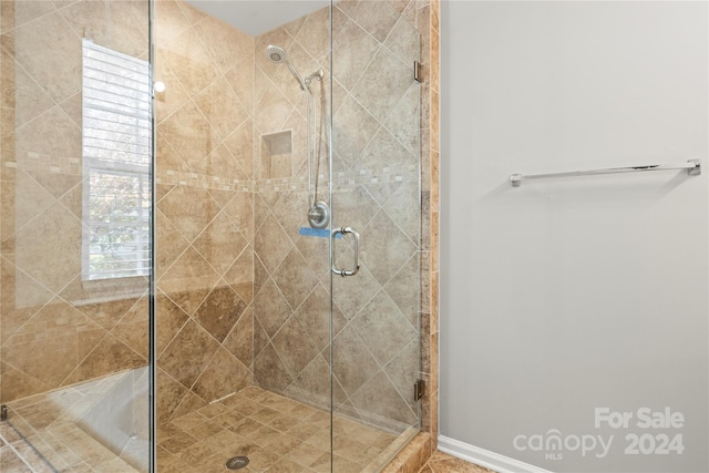 bathroom featuring walk in shower