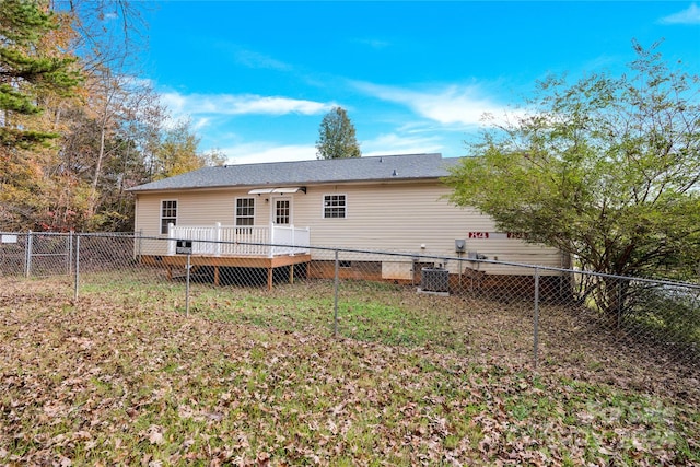 rear view of house with a deck