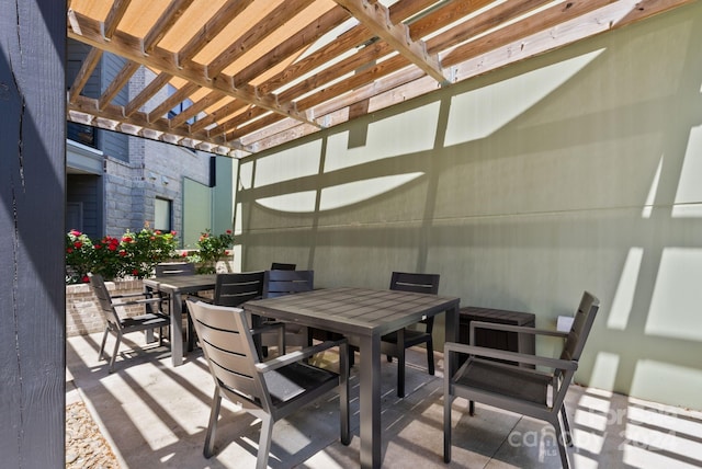 view of patio featuring a pergola