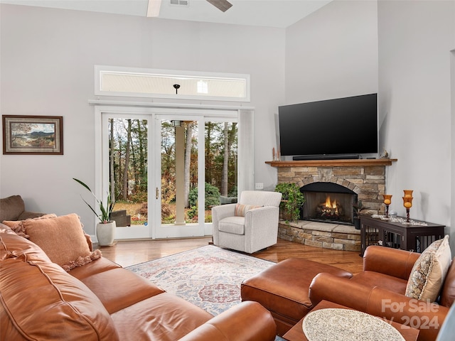 living room featuring a fireplace and hardwood / wood-style flooring