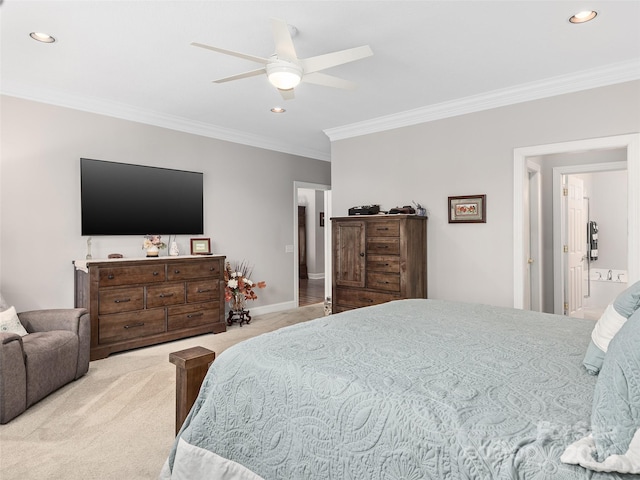 bedroom with ornamental molding, ceiling fan, light carpet, and connected bathroom