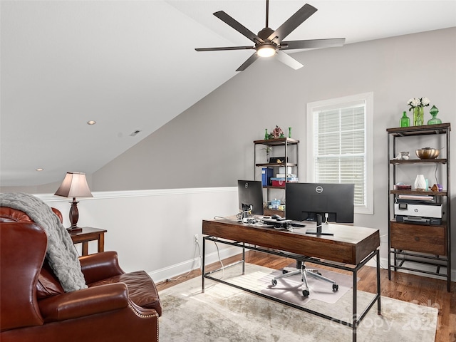 office area featuring hardwood / wood-style flooring, ceiling fan, and lofted ceiling