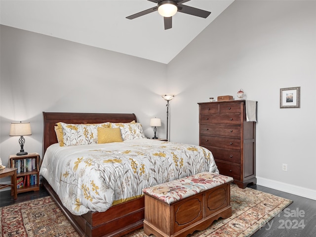 bedroom with ceiling fan, high vaulted ceiling, and dark wood-type flooring