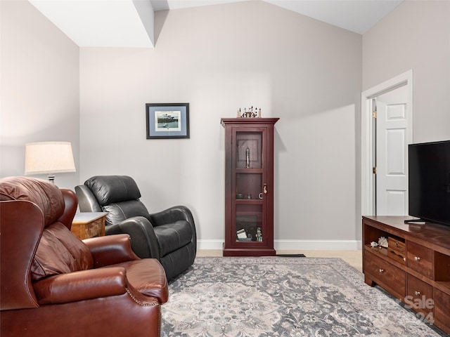 living room featuring light carpet and vaulted ceiling