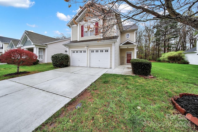 view of front property featuring a front yard and a garage