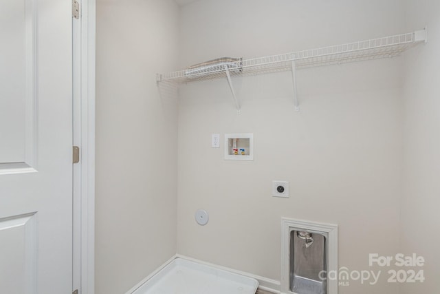 laundry room featuring hookup for an electric dryer, hookup for a washing machine, and hookup for a gas dryer