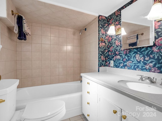 full bathroom with tile patterned flooring, vanity, toilet, and tiled shower / bath combo