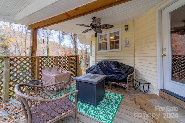 wooden terrace with ceiling fan