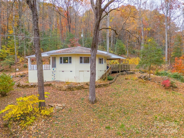 view of yard with a wooden deck