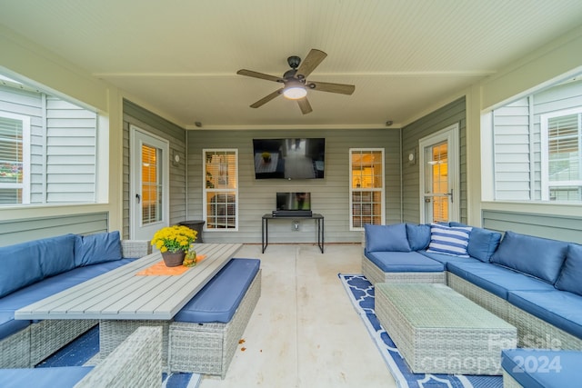 view of patio featuring outdoor lounge area and ceiling fan