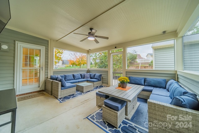 sunroom / solarium with vaulted ceiling and ceiling fan