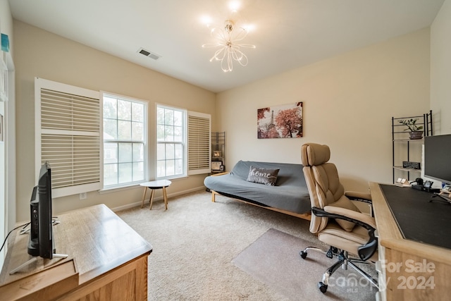 carpeted office with a notable chandelier